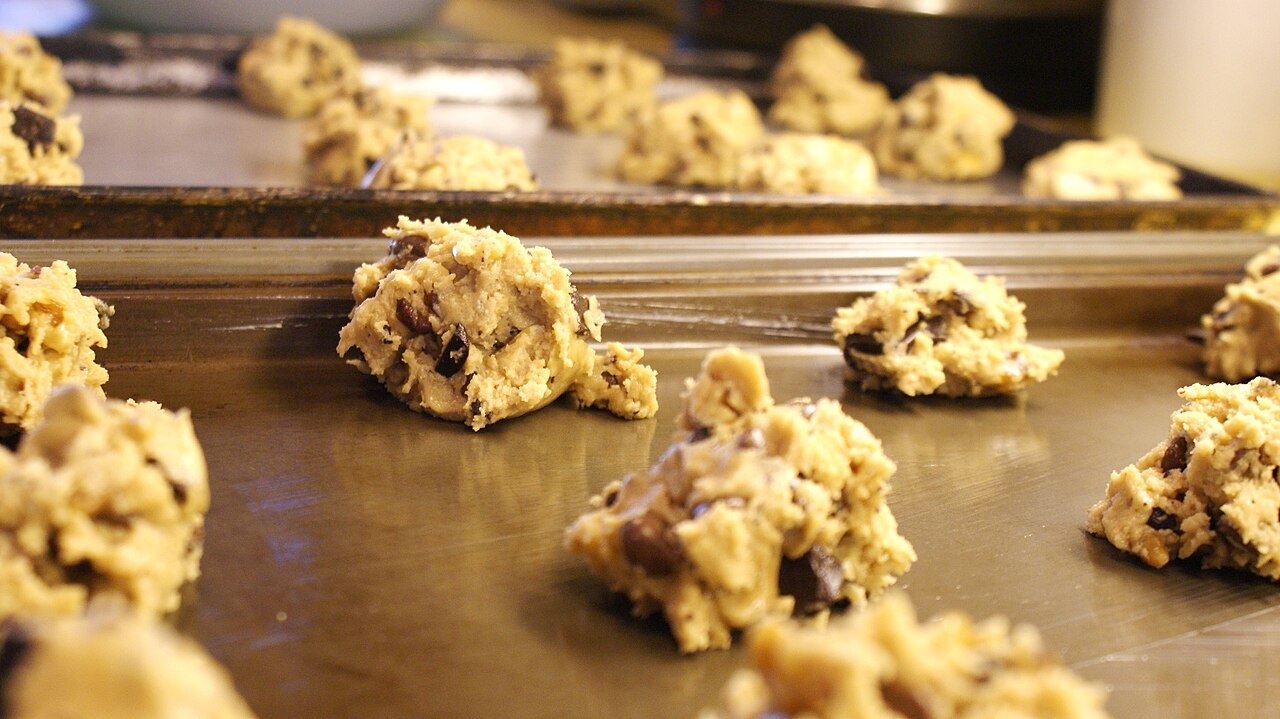 Cookie dough portioned on a baking tray