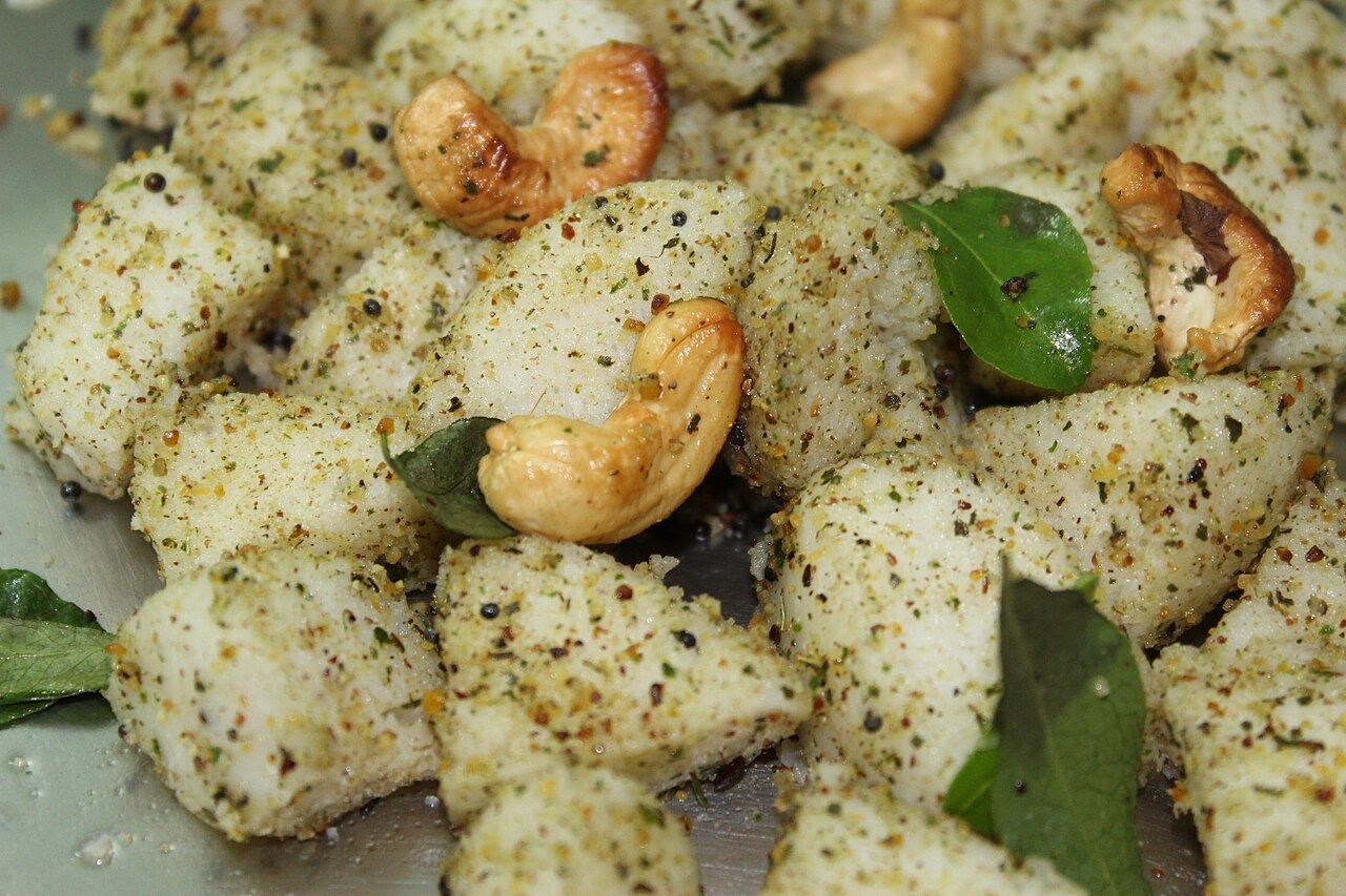 Podi idli tossed with cashews and curry leaves
